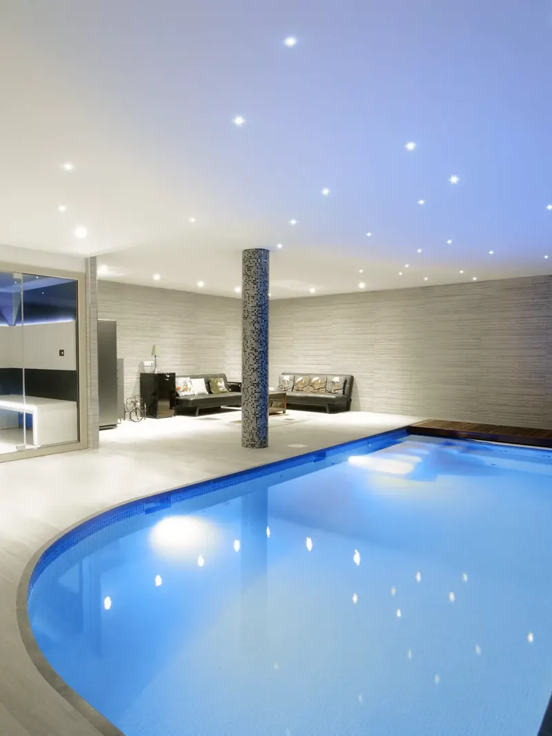 Pool room with stretch ceiling and starry sky point lighting